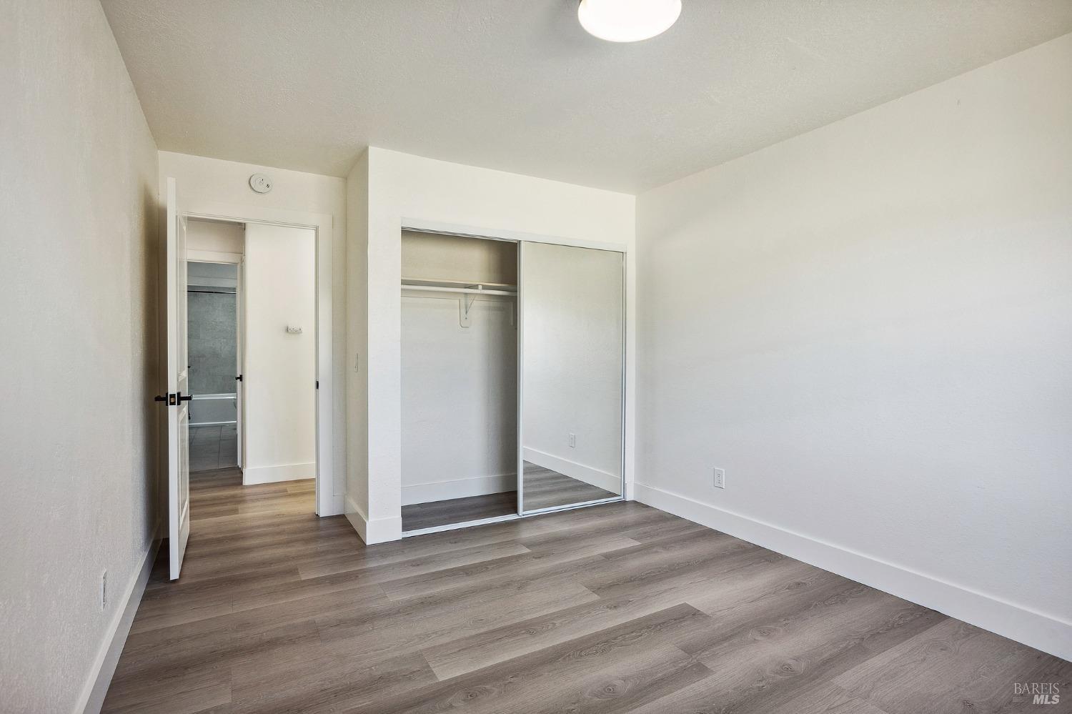 1282 Fowler Creek Road Sonoma, CA 95476 - Photo 46 of 86 a view of an empty room and wooden floor