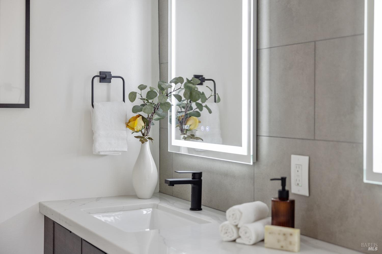 1282 Fowler Creek Road Sonoma, CA 95476 - Photo 63 of 86 a bathroom with a sink a mirror and window