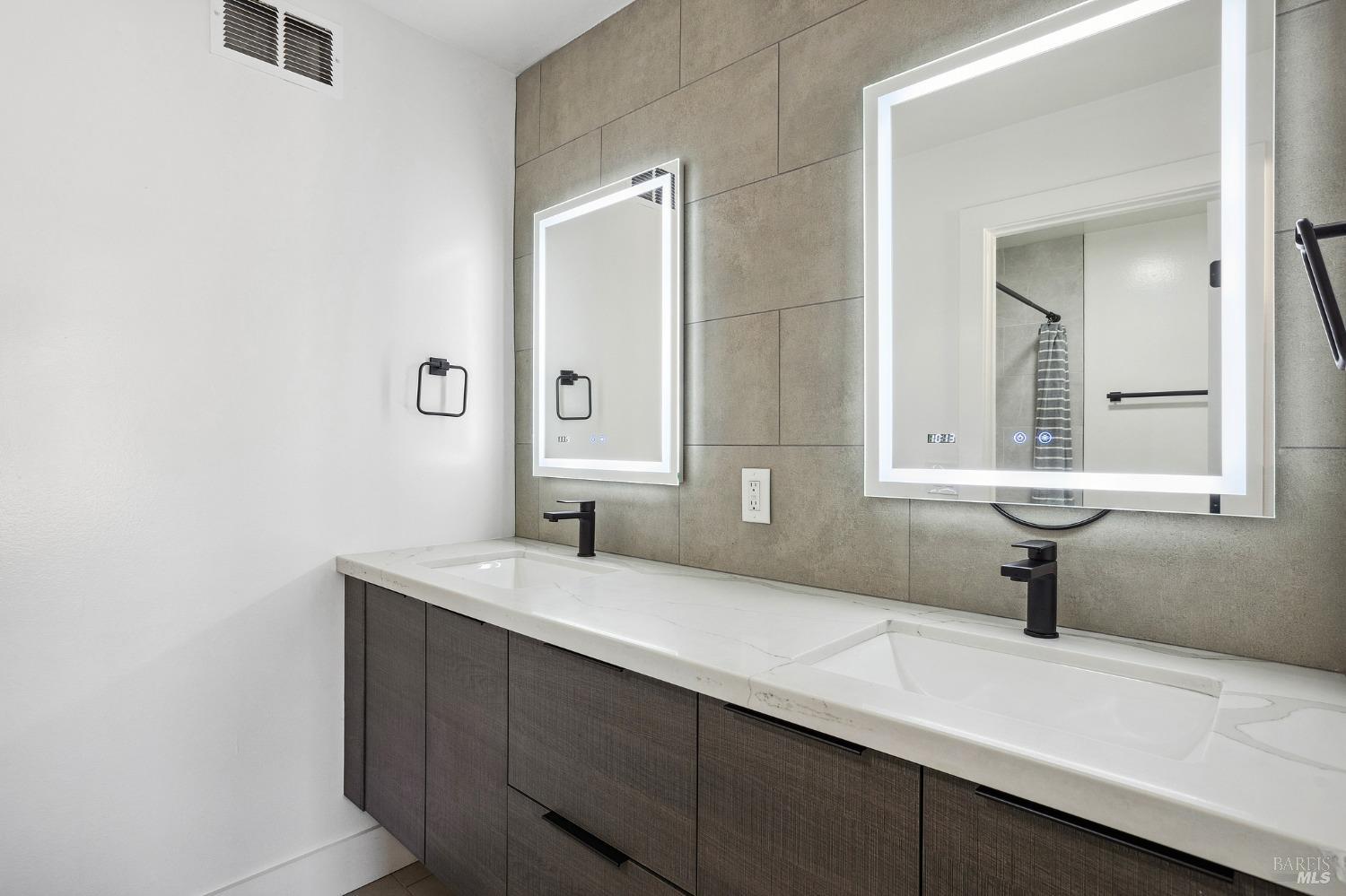 1282 Fowler Creek Road Sonoma, CA 95476 - Photo 64 of 86 a bathroom with a sink and a mirror