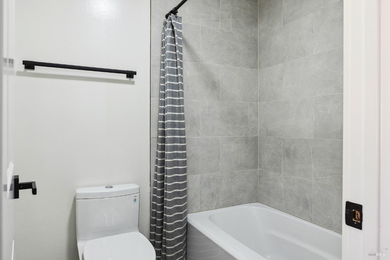 1282 Fowler Creek Road Sonoma, CA 95476 - Photo 65 of 86 a bathroom with a bathtub and a shower