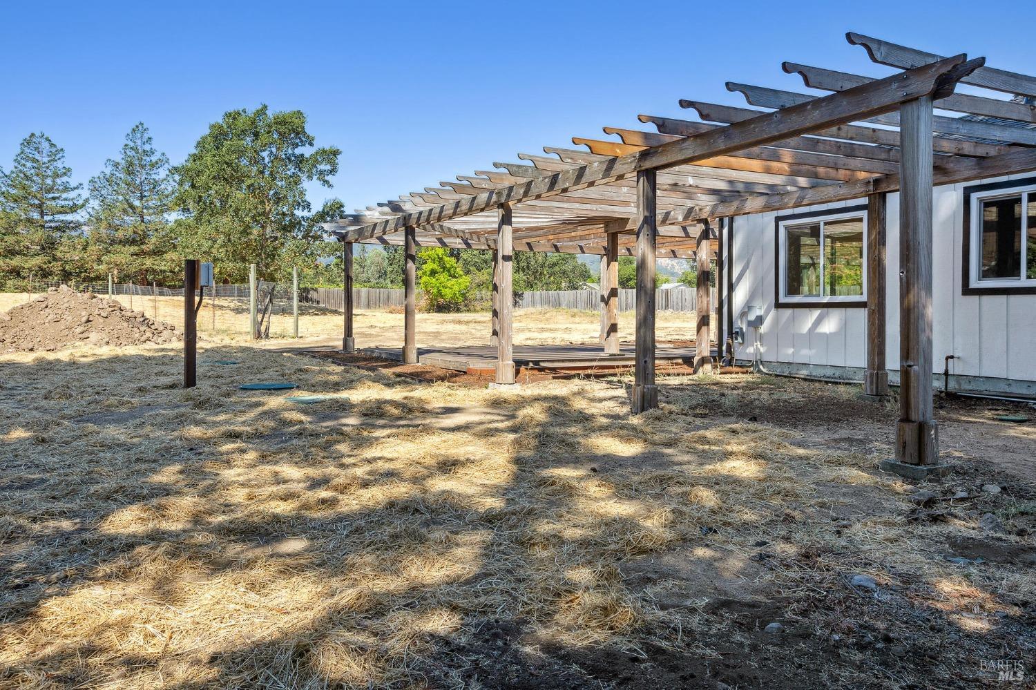 1282 Fowler Creek Road Sonoma, CA 95476 - Photo 73 of 86 a view of a house with a backyard