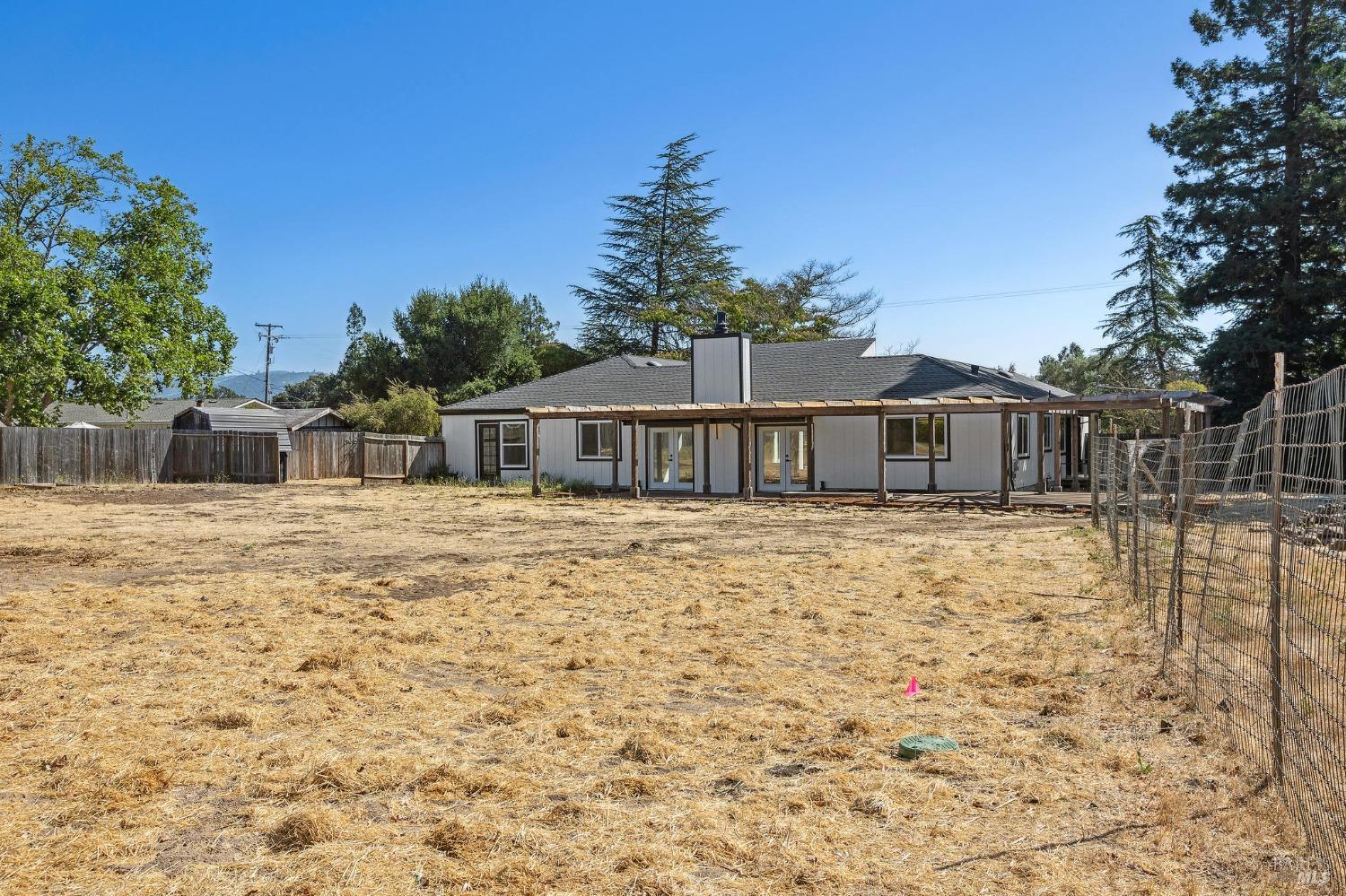1282 Fowler Creek Road Sonoma, CA 95476 - Photo 76 of 86 a front view of a house with a yard