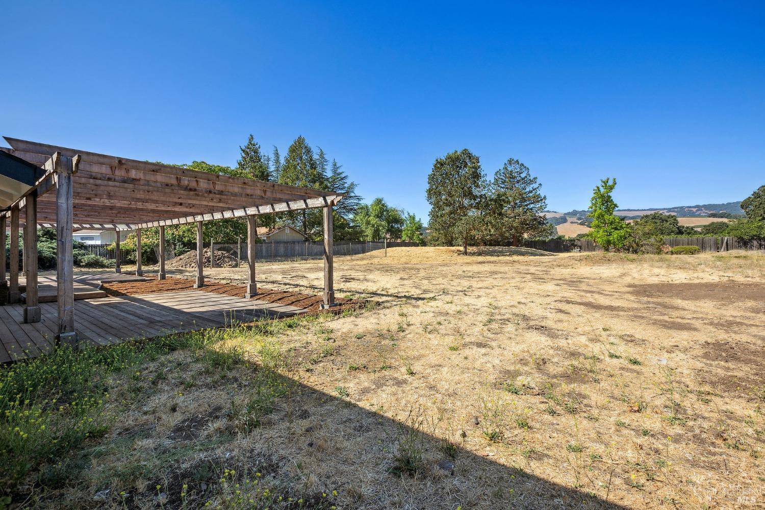 1282 Fowler Creek Road Sonoma, CA 95476 - Photo 80 of 86 a view of a yard with palm tree