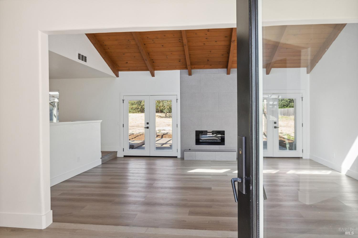 1282 Fowler Creek Road Sonoma, CA 95476 - Photo 8 of 86 a view of an entryway with wooden floor