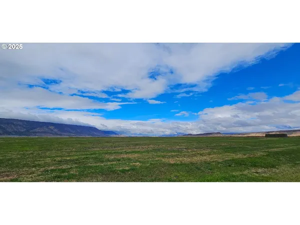 a view of ocean and mountain