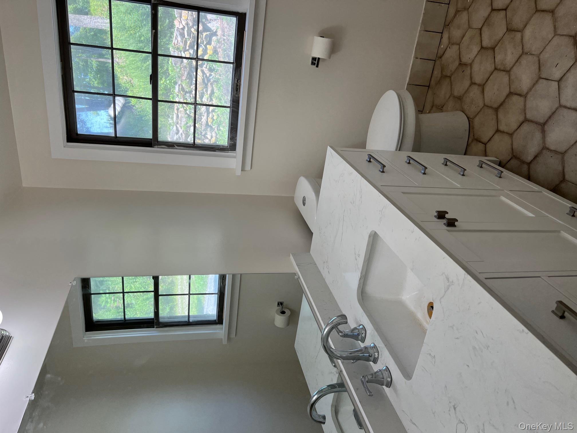 121 East Hook Cross Road Hopewell Junction, NY 12533 - Photo 9 of 16 a bathroom with a sink and a toilet
