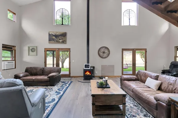 a living room with furniture and a window