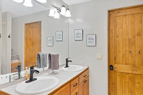 a bathroom with a shower and a tub