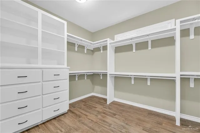 a view of an empty walk in closet