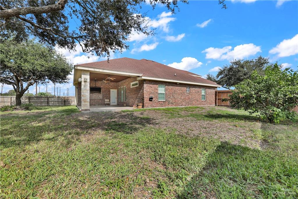 1106 Rio Blanco Street San Juan, TX 78589 - Photo 20 of 21 a house view with a garden space
