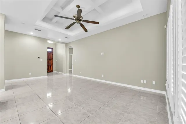a view of a livingroom with a ceiling fan