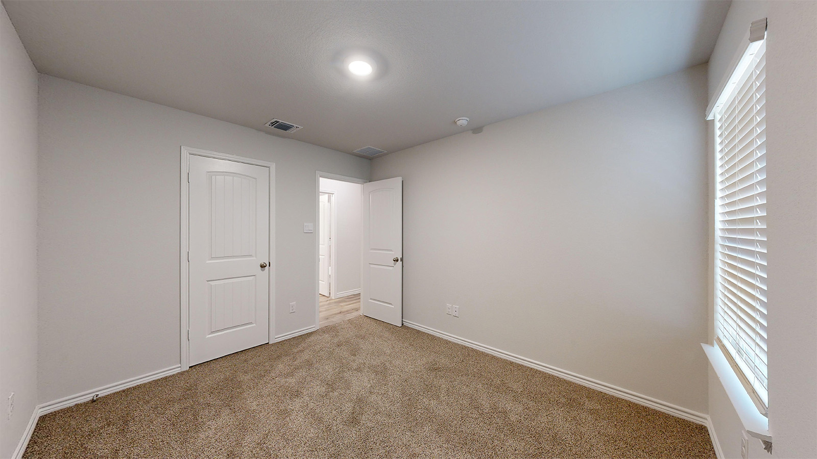 700 Gauge Road Thorndale, TX 76577 - Photo 18 of 22 Unfurnished bedroom featuring carpet flooring and baseboards