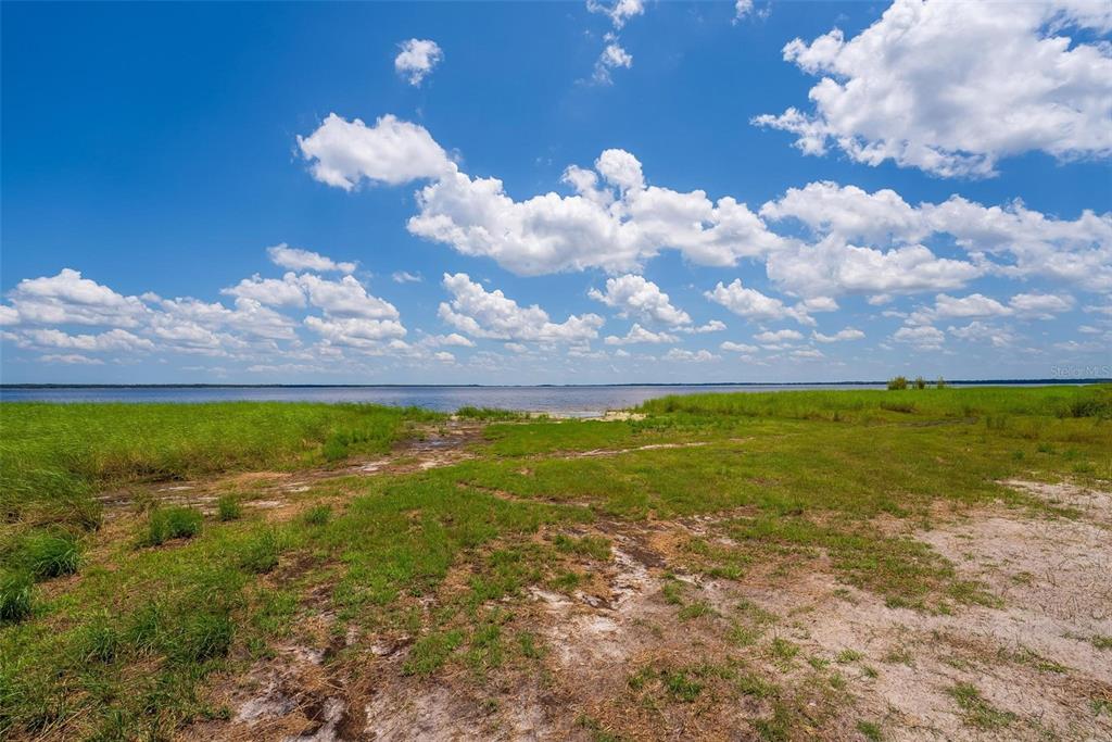 Waccassa Street Geneva, FL 32732 - Photo 5 of 23 a view of a lake with sunset