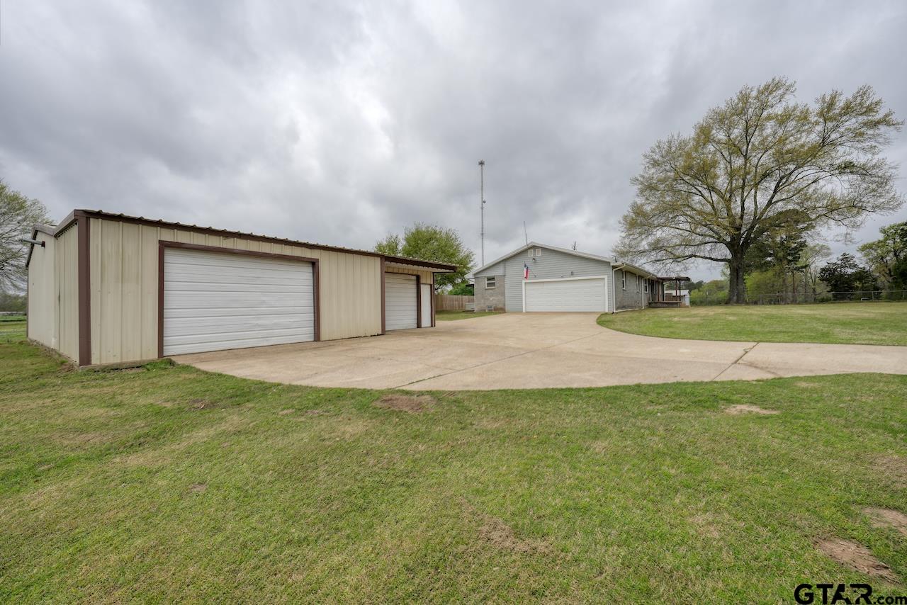 667 Allen Road Longview, TX 75605 - Photo 42 of 48 a house with garden in front of it