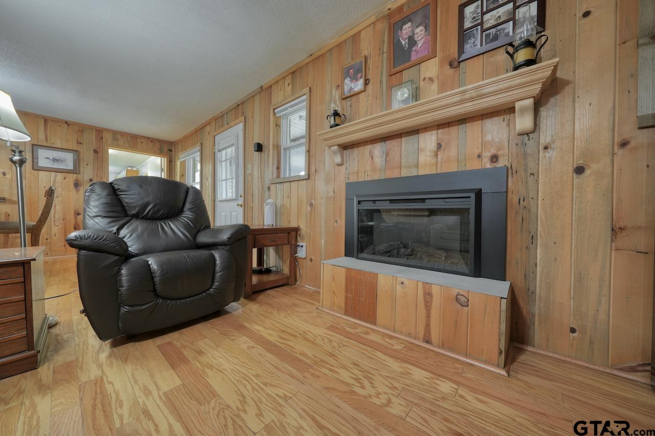 667 Allen Road Longview, TX 75605 - Photo 8 of 48 a living room with furniture and a fireplace
