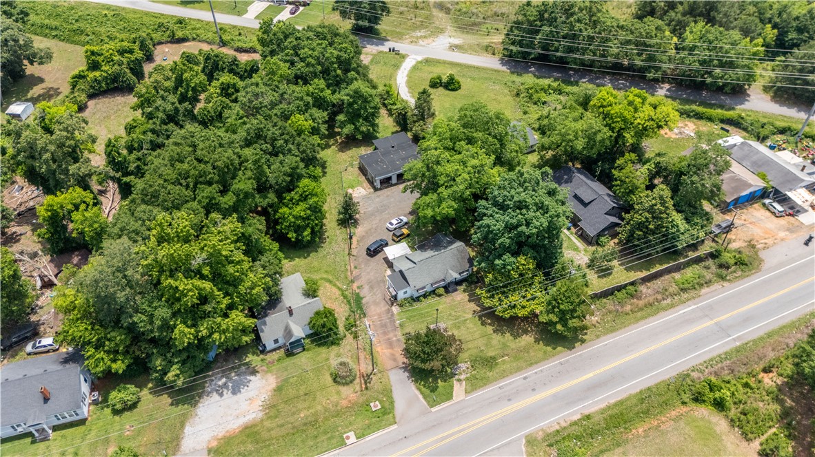 608 29 N Bypass Anderson, SC 29621 - Photo 18 of 20 An aerial perspective reveals a sprawling rural lot featuring several structures and ample undeveloped land.