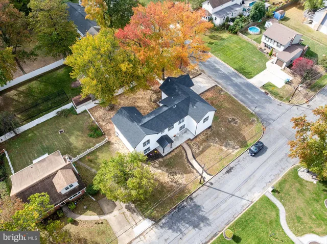 an aerial view of a house with a ocean view