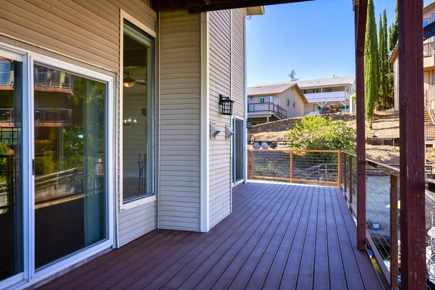 771 Mother Shipton Road Copperopolis, CA 95228 - Photo 18 of 72 Wrap-around deck off the great room.