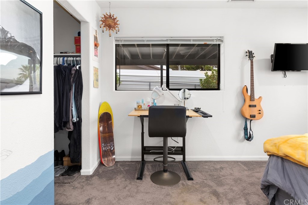 60467 Natoma Trail Joshua Tree, CA 92252 - Photo 40 of 63 a workspace with furniture and window