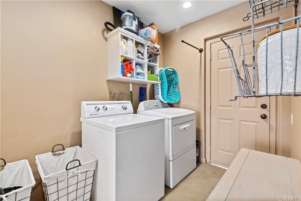 60467 Natoma Trail Joshua Tree, CA 92252 - Photo 45 of 63 a utility room with dryer and washer