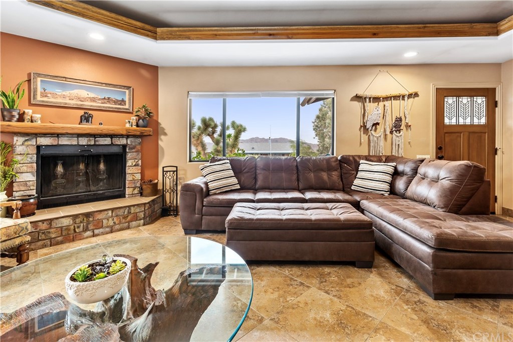 60467 Natoma Trail Joshua Tree, CA 92252 - Photo 6 of 63 a living room with furniture and a fireplace