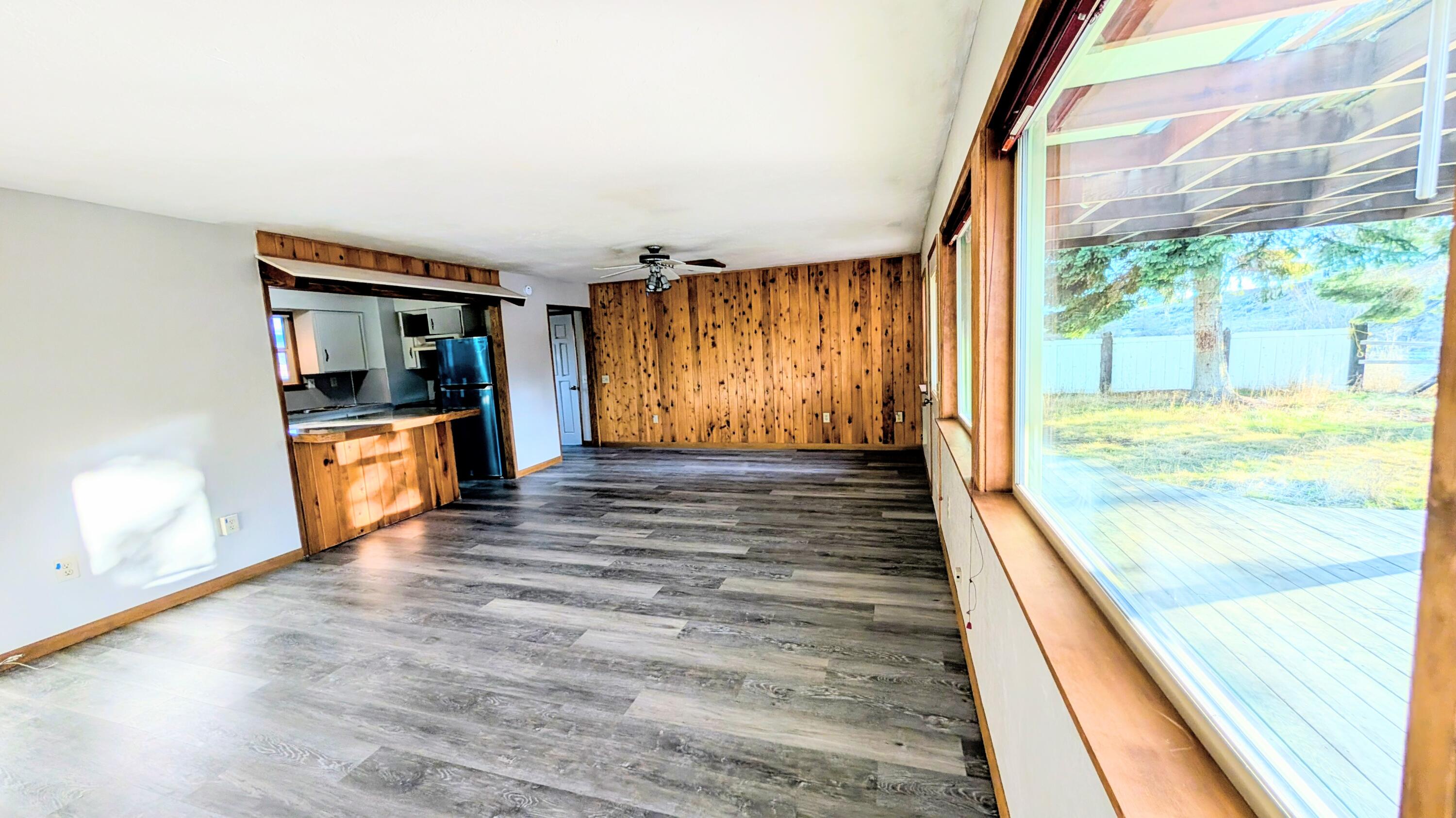 32550 Rivers Drive Chiloquin, OR 97624 - Photo 5 of 24 a view of an entryway with wooden floor and door