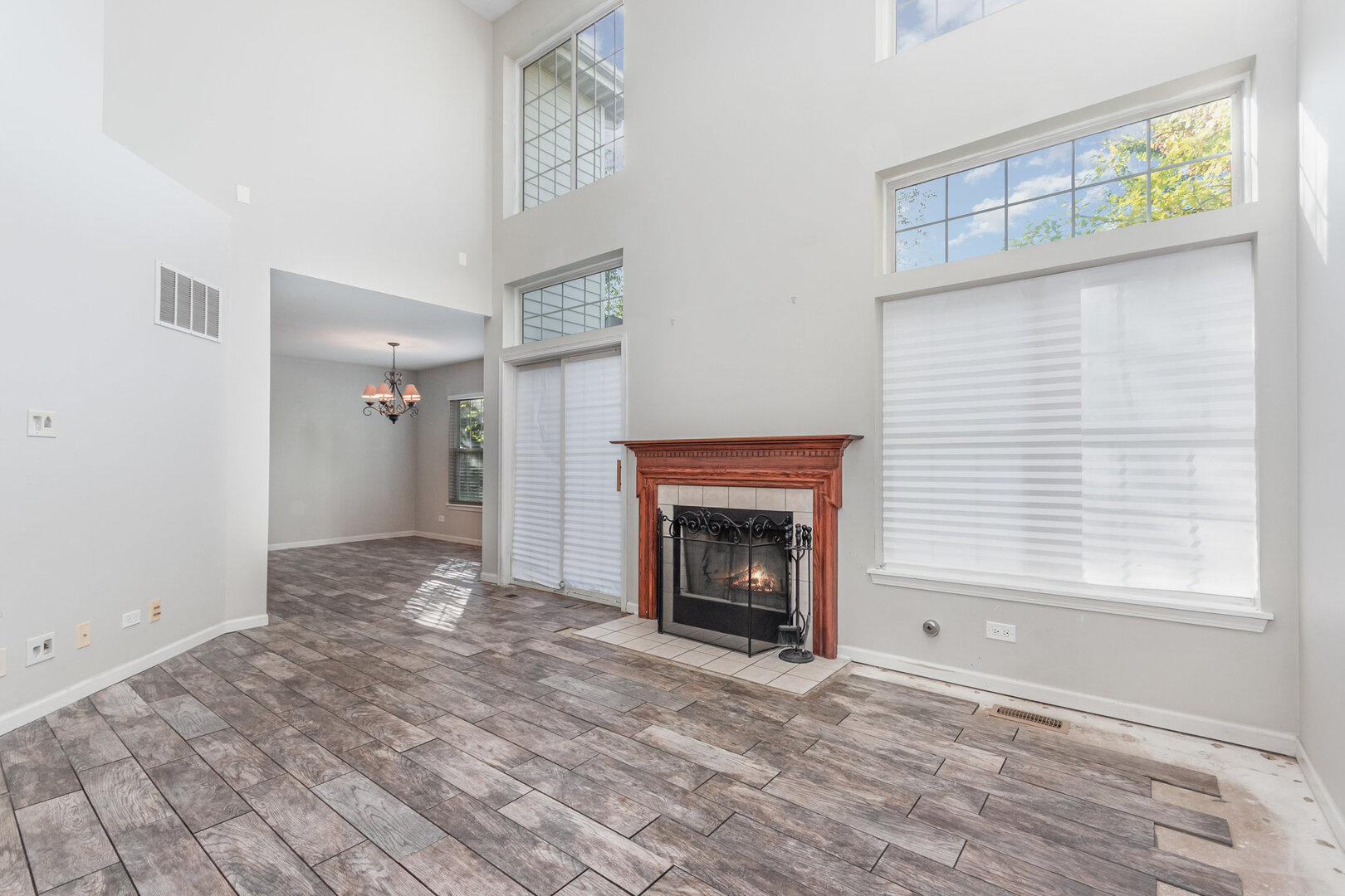 2271 Scott Lane Aurora, IL 60502 - Photo 4 of 18 a view of empty room with window and fireplace