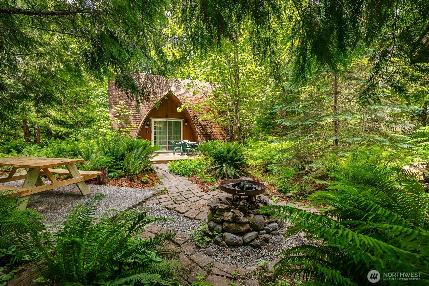 14001 Welcome Road Glacier, WA 98244 - Photo 1 of 39 a backyard of a house with lots of green space