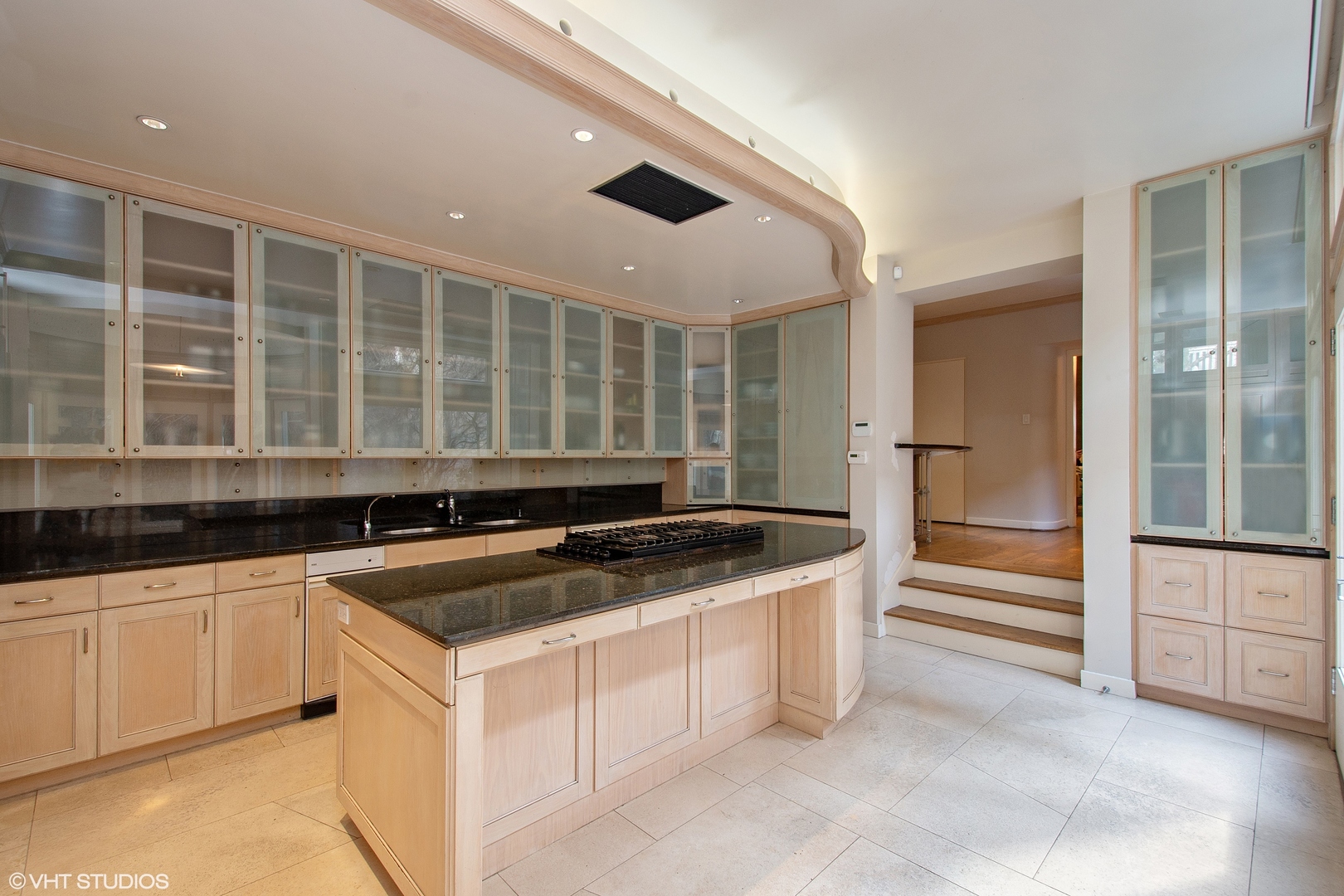 1442 North Astor Street Chicago, IL 60610 - Photo 17 of 55 a kitchen with granite countertop a sink and cabinets