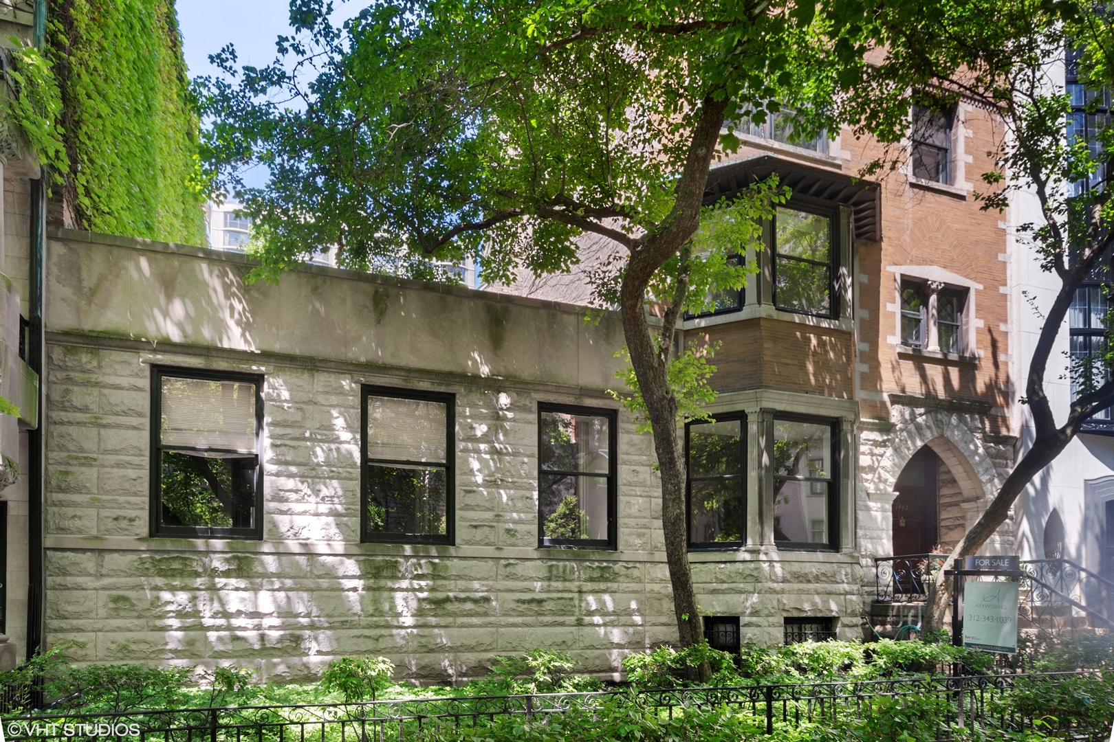 1442 North Astor Street Chicago, IL 60610 - Photo 2 of 55 front view of a brick house with a large windows