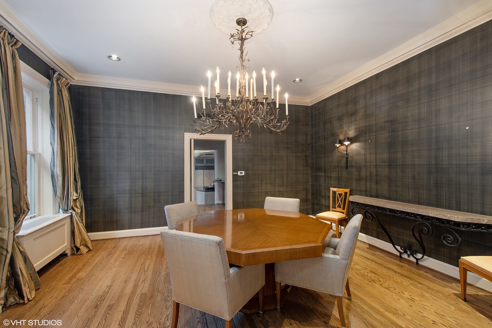 1442 North Astor Street Chicago, IL 60610 - Photo 25 of 55 a view of a dining room with furniture and chandelier