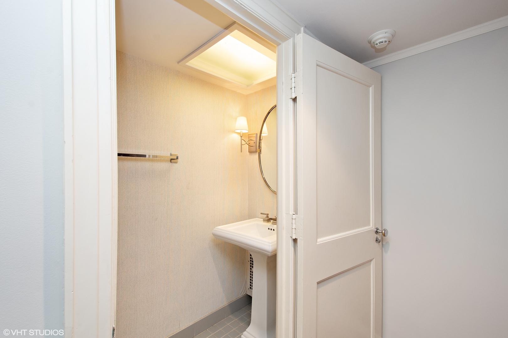 1442 North Astor Street Chicago, IL 60610 - Photo 38 of 55 a bathroom with a sink a mirror and a shower