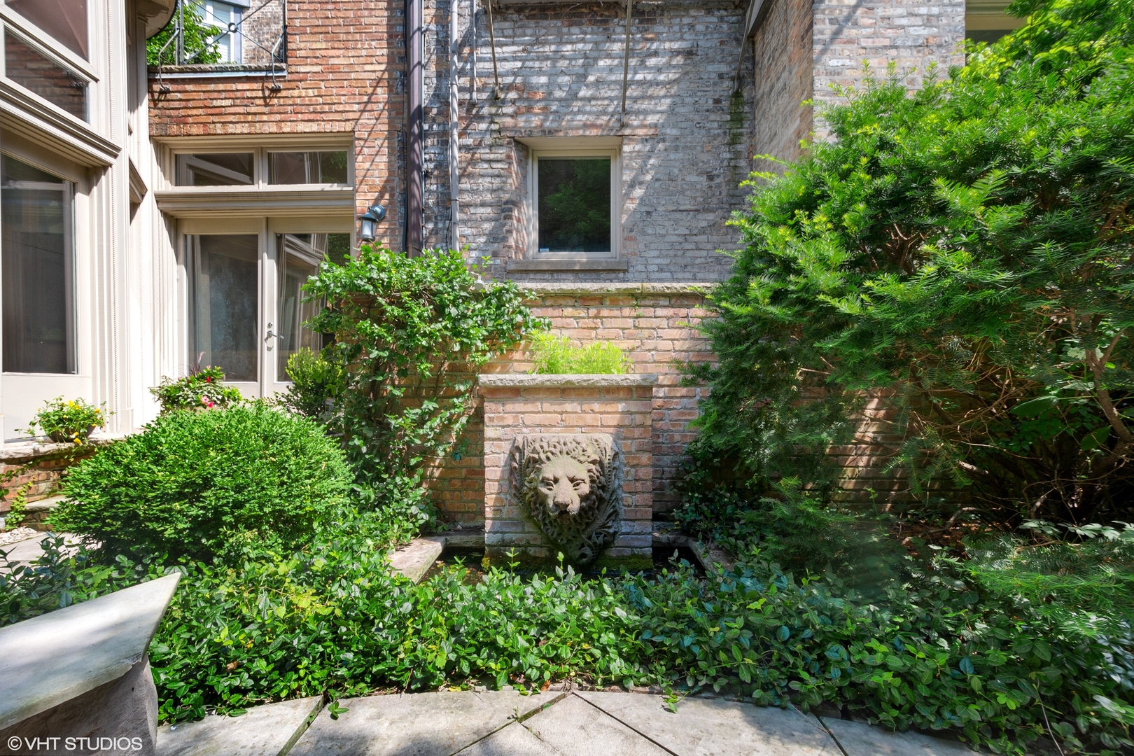 1442 North Astor Street Chicago, IL 60610 - Photo 47 of 55 an aerial view of a house with plants and garden