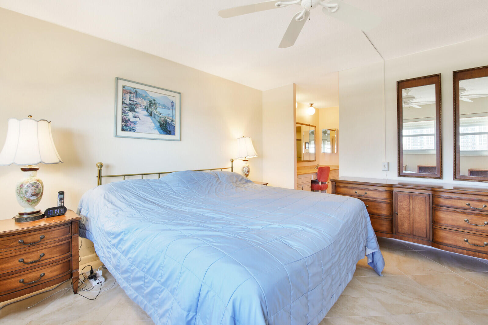 401 Briny Avenue, Unit 516 Pompano Beach, FL 33062 - Photo 22 of 38 a bedroom with a large bed and a window