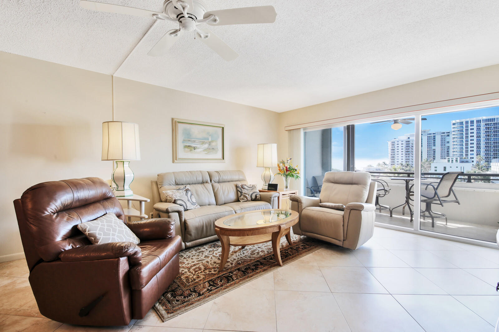 401 Briny Avenue, Unit 516 Pompano Beach, FL 33062 - Photo 7 of 38 a living room with furniture and a large window