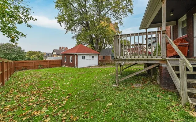 a house view with a garden space