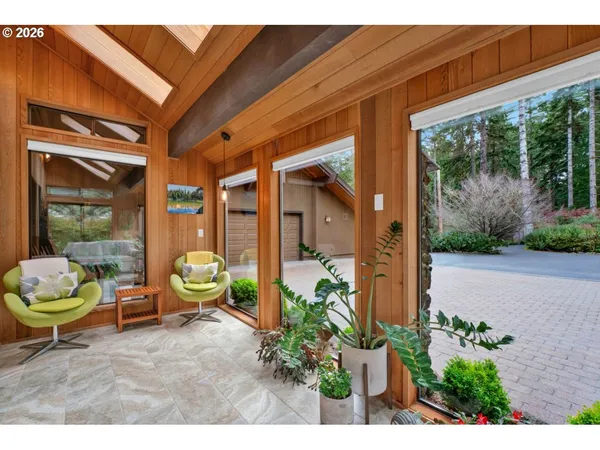 a outdoor living space with furniture and garden view