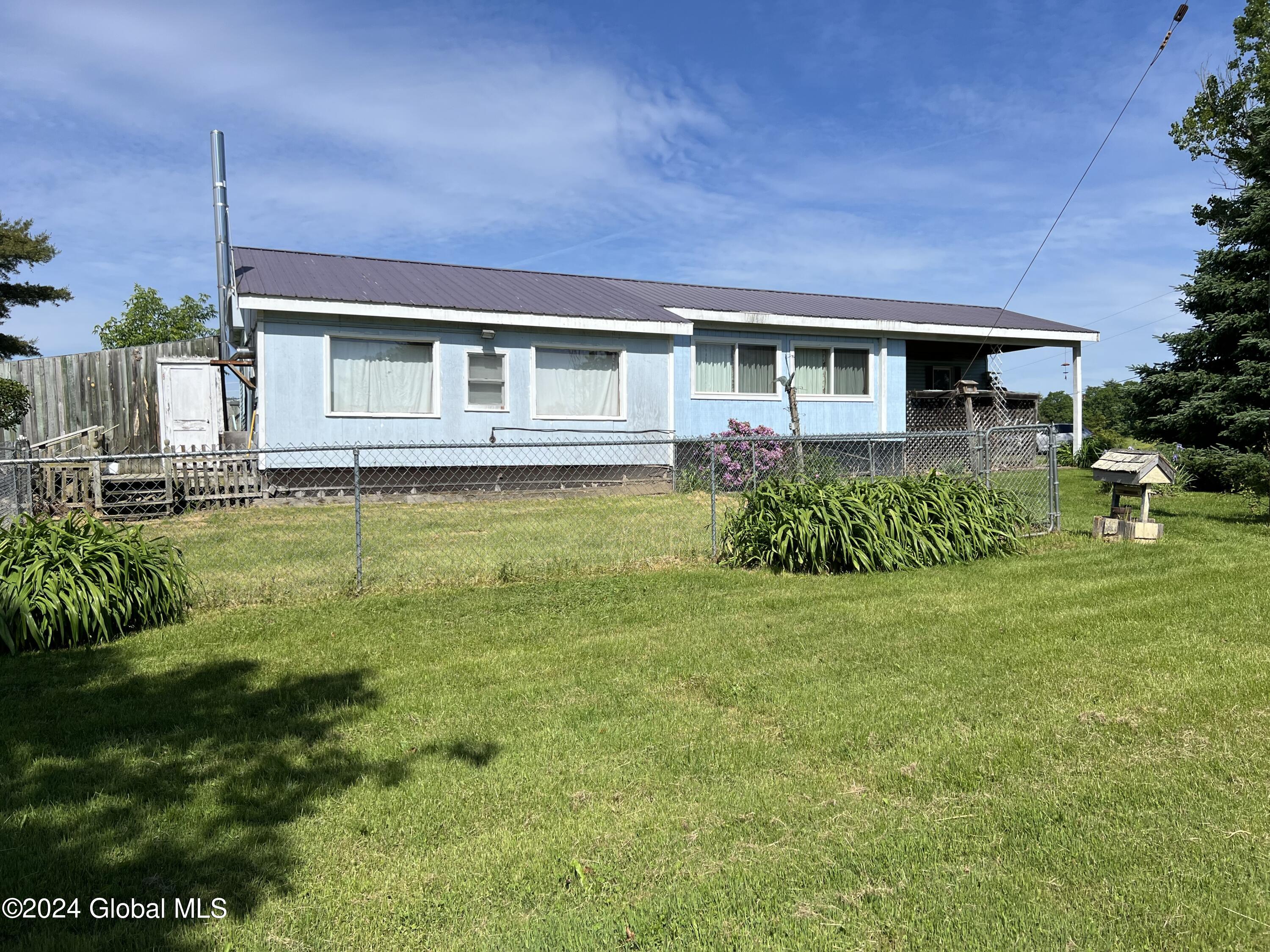 37 Wade Road Whitehall, NY 12887 - Photo 1 of 24 East Side of Home