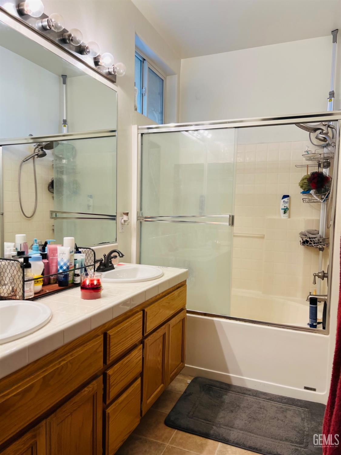 Undisclosed Address Bakersfield, CA 93313 - Photo 8 of 13 a bathroom with a sink and a shower