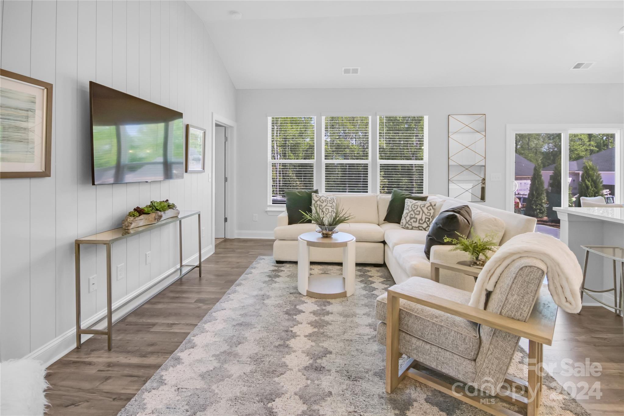 3159 Laurel Brook Drive Denver, NC 28037 - Photo 13 of 30 a living room with furniture and a flat screen tv