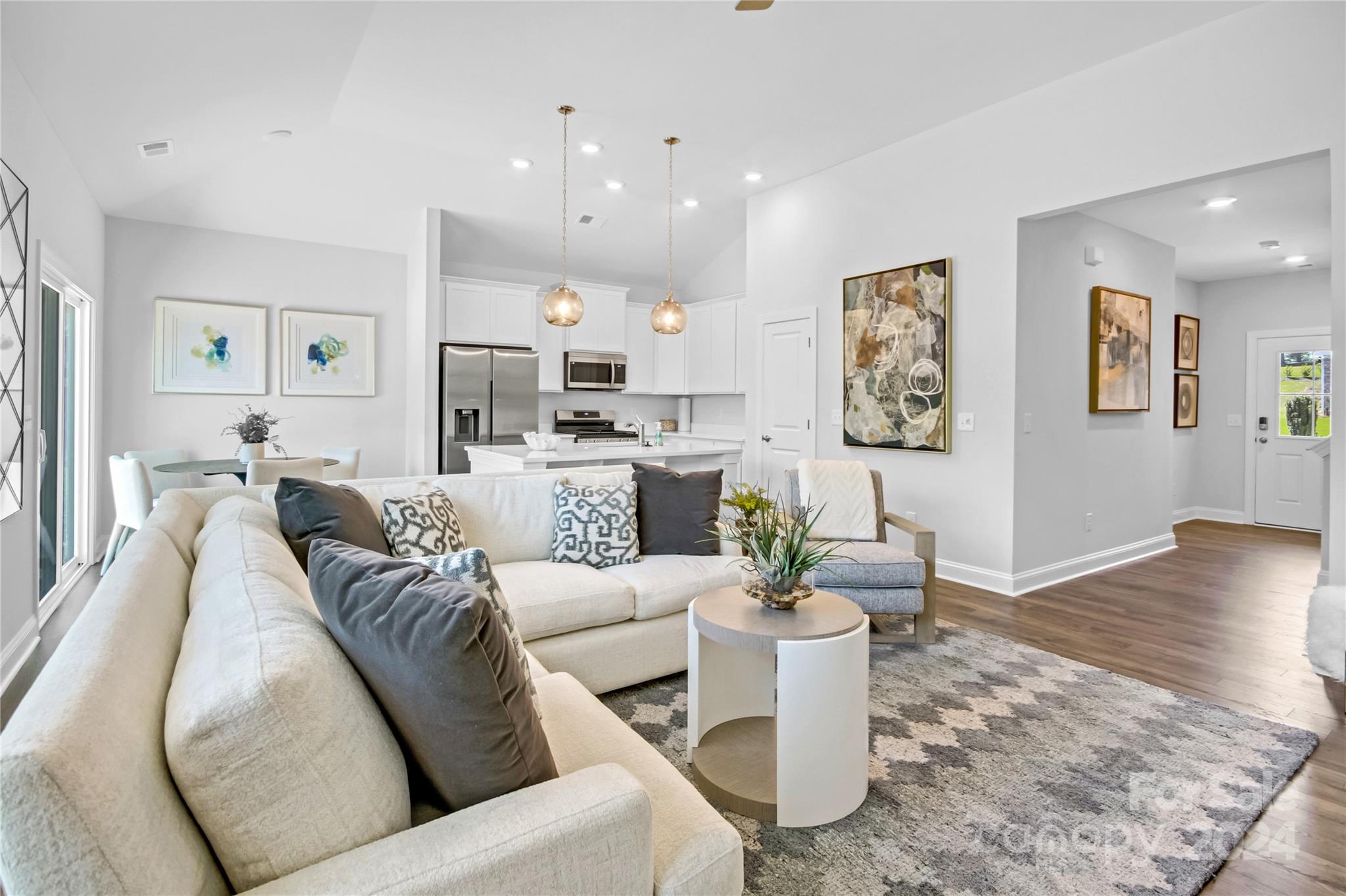 3159 Laurel Brook Drive Denver, NC 28037 - Photo 9 of 30 a living room with furniture and wooden floor
