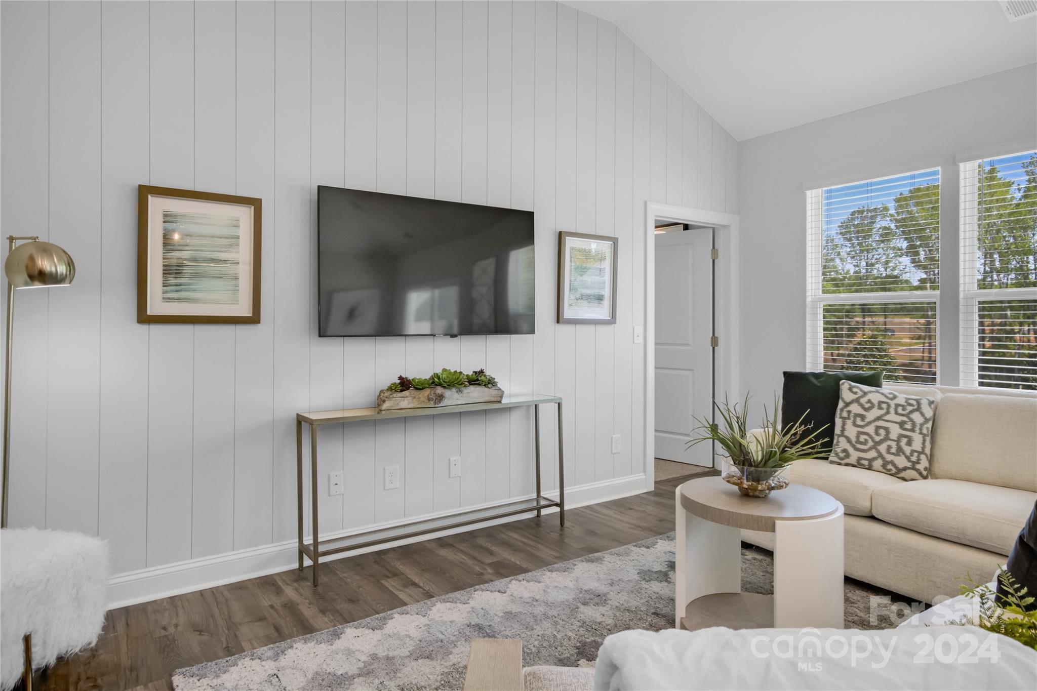 3159 Laurel Brook Drive Denver, NC 28037 - Photo 10 of 30 a living room with furniture and a flat screen tv