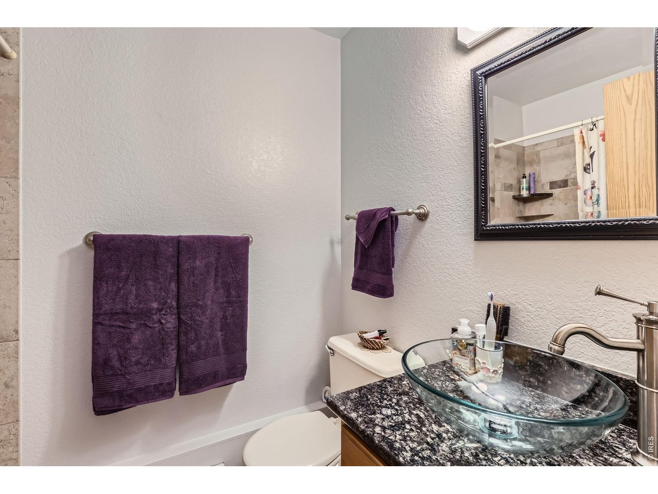 3515 28th Street, Unit 108 Boulder, CO 80301 - Photo 16 of 29 Both Baths have stylish glass vessel sinks and updated granite counters