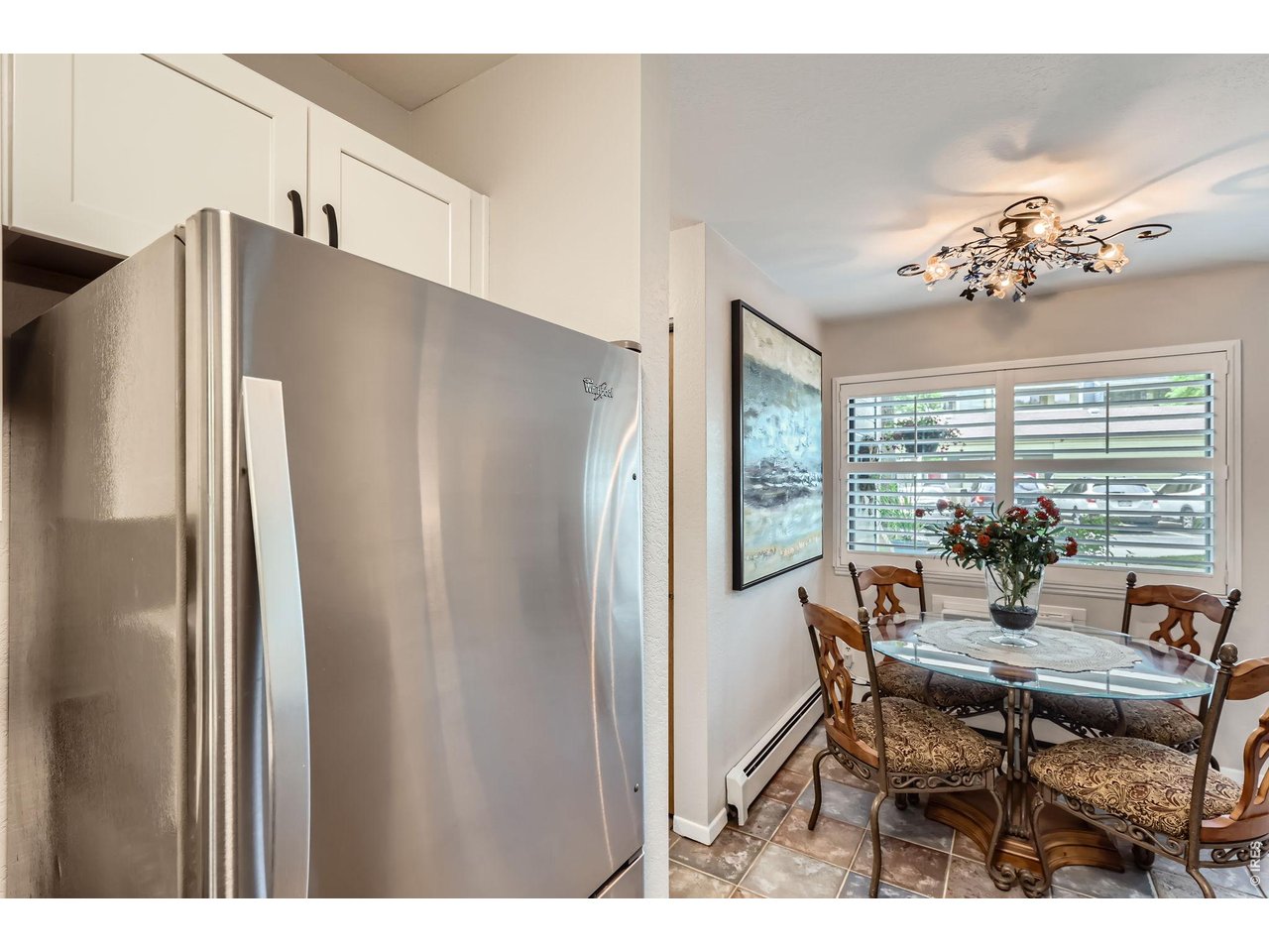 3515 28th Street, Unit 108 Boulder, CO 80301 - Photo 10 of 29 Separate Dining Room with one-of-a-kind chandelier