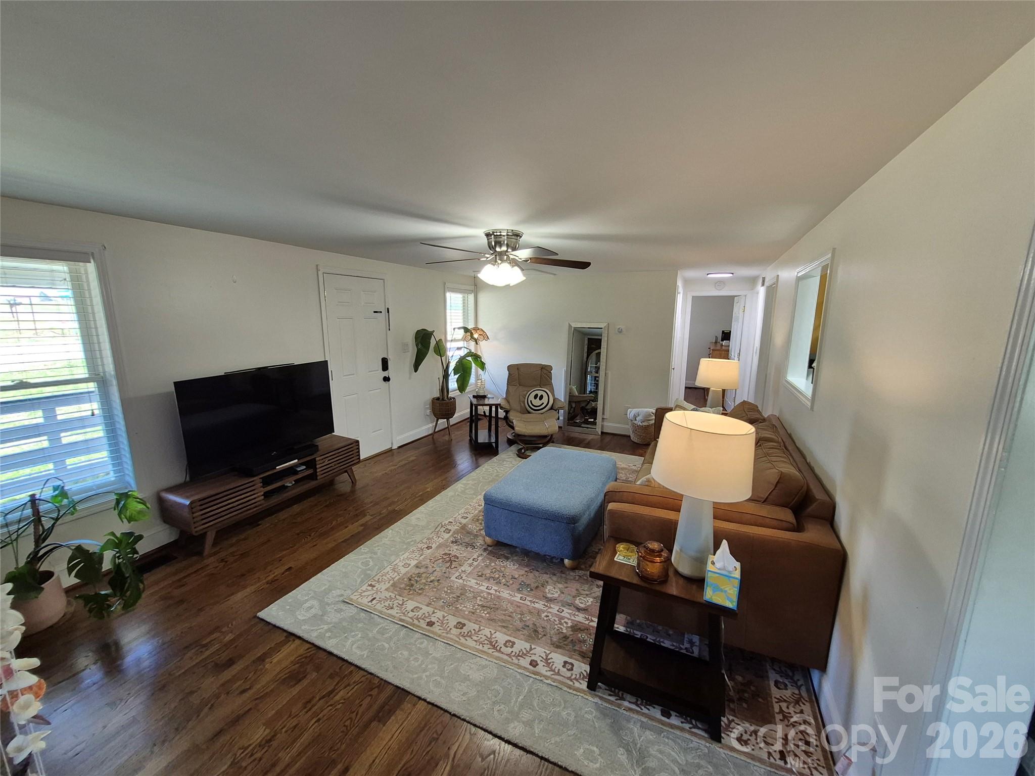 4438 Reepsville Road Vale, NC 28168 - Photo 16 of 32 a living room with furniture and a flat screen tv