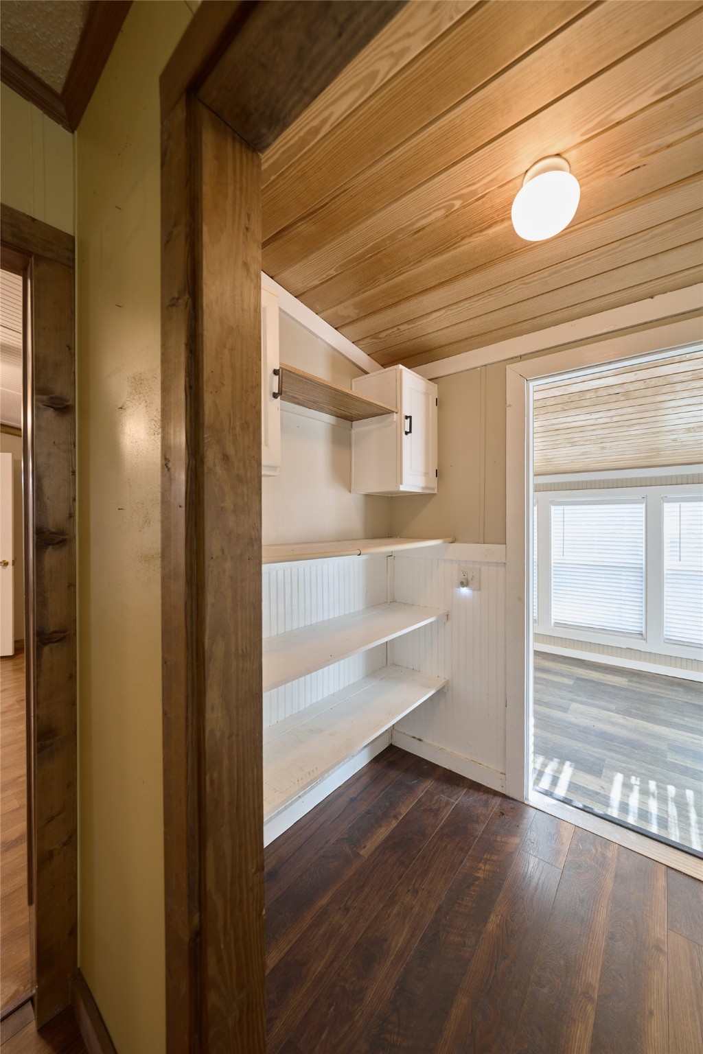 17381 FM 1484 Road Conroe, TX 77303 - Photo 22 of 37 a view of a room with wooden floor and windows