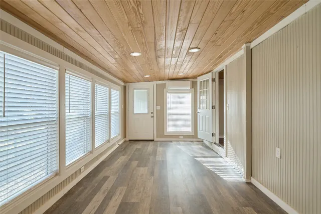 a view of entryway with wooden floor