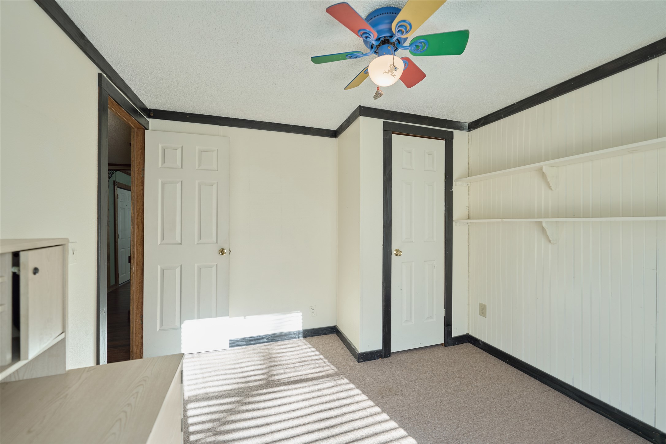 17381 FM 1484 Road Conroe, TX 77303 - Photo 36 of 37 a view of a hallway with a bedroom