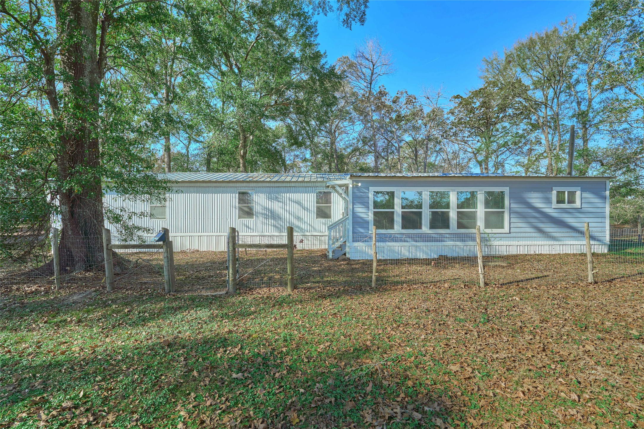 17381 FM 1484 Road Conroe, TX 77303 - Photo 10 of 37 a house view with a backyard