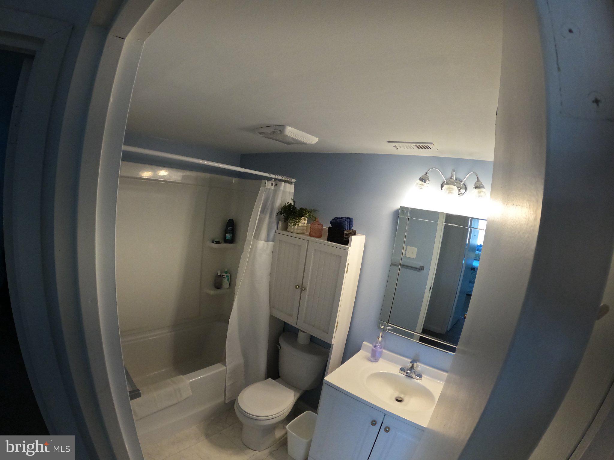 13907 Sand Dune Road, Unit 9A Ocean City, MD 21842 - Photo 21 of 28 Bright and airy bathroom retreat.